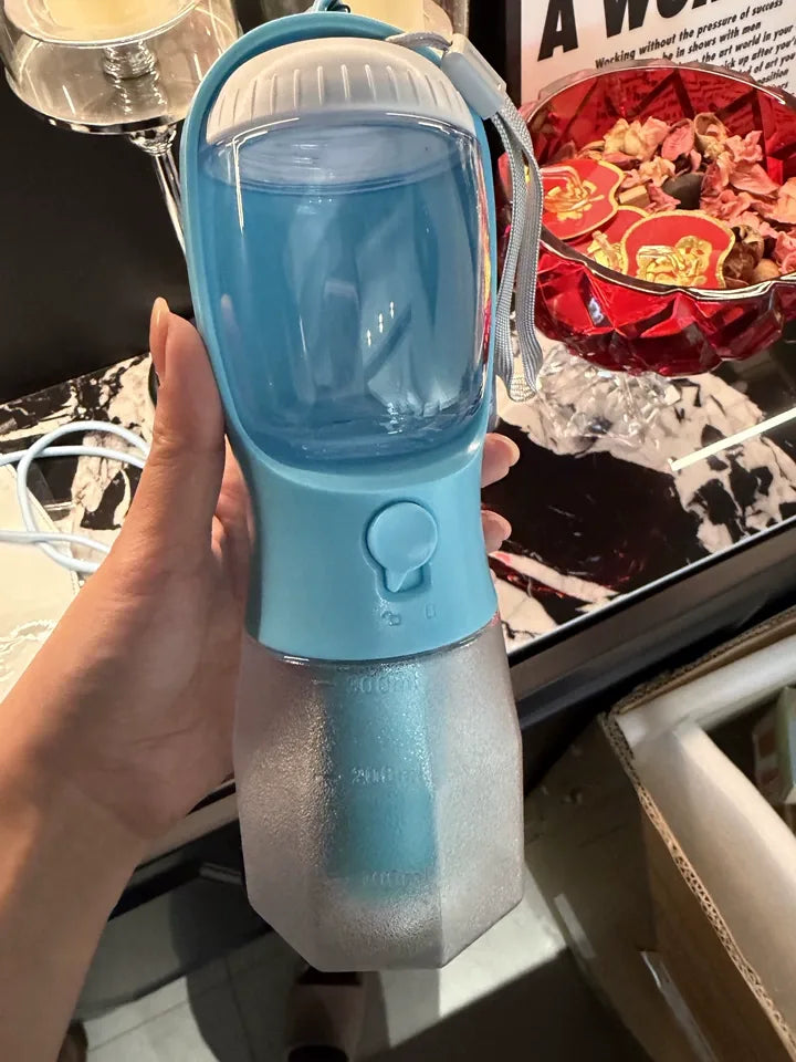 Customer photo of a blue ORELIS travel bottle held indoors